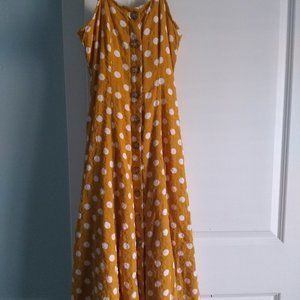 yellow dress with white polka dots